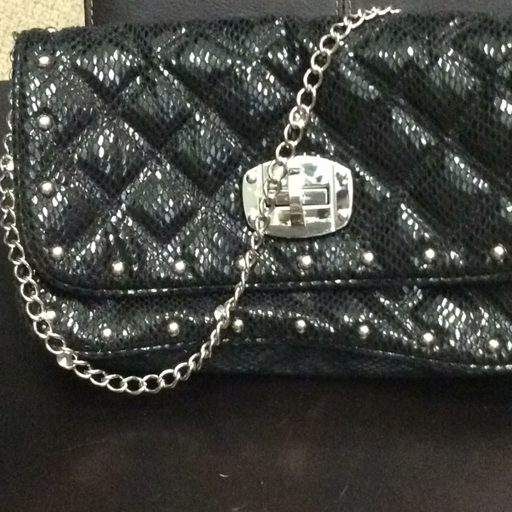 Black with silver metallic handle